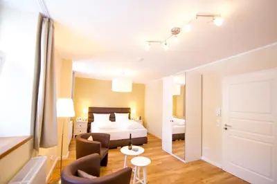 Ein Bett oder Betten in einem Zimmer der Unterkunft Gästehaus C.H.Berres Ürzig-Mosel