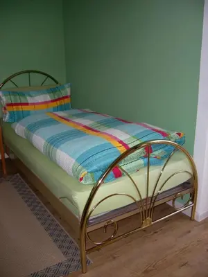 Ein Bett oder Betten in einem Zimmer der Unterkunft Landhaus Bad Bertrich