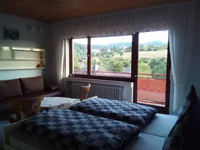 Ein Bett oder Betten in einem Zimmer der Unterkunft Pension Mühlenhardt