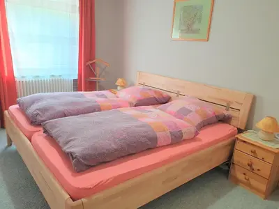 Ein Bett oder Betten in einem Zimmer der Unterkunft Ferienwohnung Späth