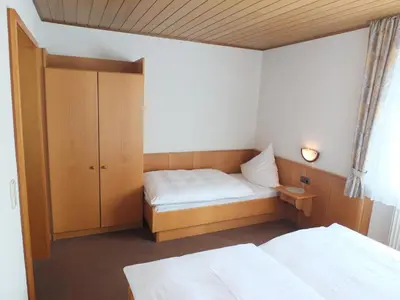 Ein Bett oder Betten in einem Zimmer der Unterkunft Pension Milberg Assmannshausen
