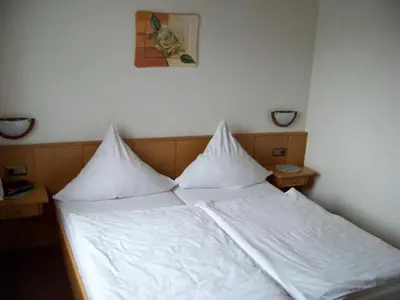 Ein Bett oder Betten in einem Zimmer der Unterkunft Pension Milberg Assmannshausen