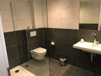 Ein Badezimmer in der Unterkunft Hotel Klapperburg