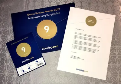 Ein Zertifikat, Auszeichnung, Logo oder anderes Dokument, das in der Unterkunft Ferienwohnung Burgenblick ausgestellt ist