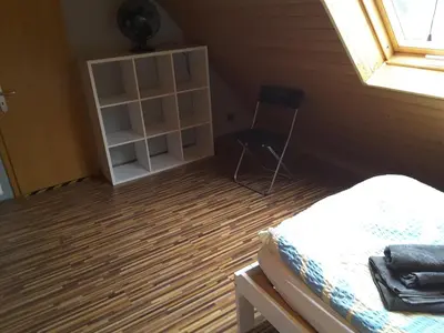 Ein Bett oder Betten in einem Zimmer der Unterkunft KRIO Nicola Rothfuchs Ferienwohnung 2