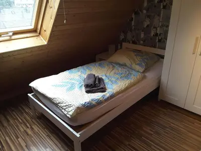 Ein Bett oder Betten in einem Zimmer der Unterkunft KRIO Nicola Rothfuchs Ferienwohnung 2