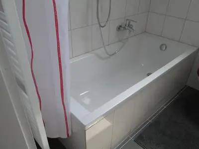Ein Badezimmer in der Unterkunft KRIO Nicola Rothfuchs Ferienwohnung 2