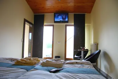 Ein Bett oder Betten in einem Zimmer der Unterkunft Bistro im Ring