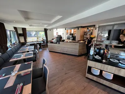 Ein Sitzbereich in der Unterkunft Hotel Am Tiergarten