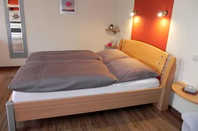 Ein Bett oder Betten in einem Zimmer der Unterkunft Ferienwohnung Tilli