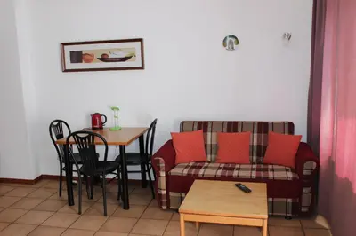 Ein Sitzbereich in der Unterkunft Ferienwohnung Holunderweg