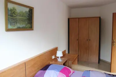 Ein Bett oder Betten in einem Zimmer der Unterkunft Ferienwohnung Holunderweg