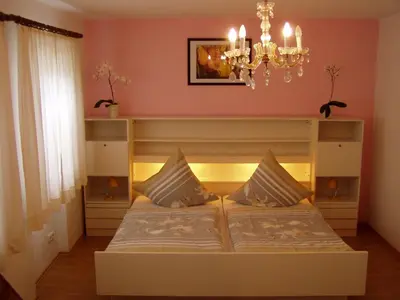 Ein Bett oder Betten in einem Zimmer der Unterkunft Ferienhaus Waldrand