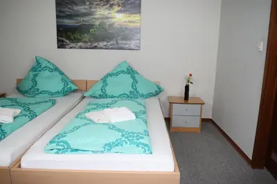 Ein Bett oder Betten in einem Zimmer der Unterkunft Hotel Restaurant Balkan