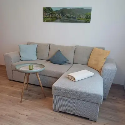 Ein Sitzbereich in der Unterkunft Ferienwohnung Am Garten