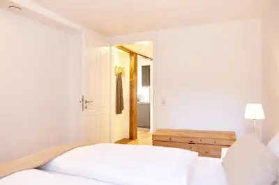 Ein Bett oder Betten in einem Zimmer der Unterkunft Zehn