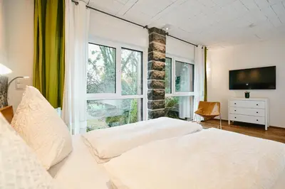 Ein Bett oder Betten in einem Zimmer der Unterkunft Basalt-Loft