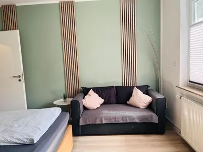 Ein Bett oder Betten in einem Zimmer der Unterkunft Ferienwohnung Weins