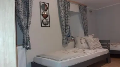 Ein Bett oder Betten in einem Zimmer der Unterkunft Ferienhaus Feinen