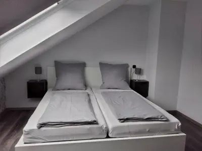 Ein Bett oder Betten in einem Zimmer der Unterkunft Ferienwohnung- Freuen