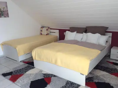 Ein Bett oder Betten in einem Zimmer der Unterkunft Haus Irena