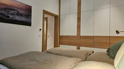 Ein Bett oder Betten in einem Zimmer der Unterkunft Landhaus Wald und See 3