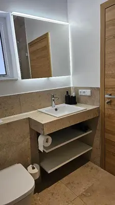Ein Badezimmer in der Unterkunft Landhaus Wald und See 3
