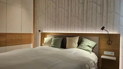 Ein Bett oder Betten in einem Zimmer der Unterkunft Landhaus Wald und See 3