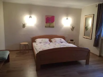 Ein Bett oder Betten in einem Zimmer der Unterkunft Ferienwohnung Michels