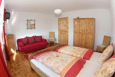 Ein Bett oder Betten in einem Zimmer der Unterkunft Gästehaus Möseler