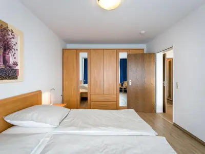 Ein Bett oder Betten in einem Zimmer der Unterkunft Apartment Rheinblick - A1208 by Interhome