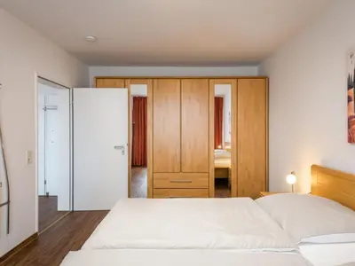 Ein Bett oder Betten in einem Zimmer der Unterkunft Apartment Wiesenblick - A706 by Interhome