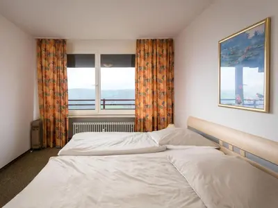 Ein Bett oder Betten in einem Zimmer der Unterkunft Apartment Talblick - B1101 by Interhome