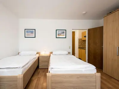 Ein Bett oder Betten in einem Zimmer der Unterkunft Apartment Wanderlust - B212 by Interhome