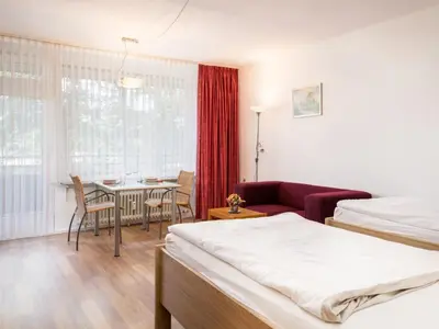 Ein Bett oder Betten in einem Zimmer der Unterkunft Apartment Wanderlust - B212 by Interhome