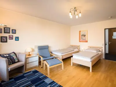 Ein Bett oder Betten in einem Zimmer der Unterkunft Apartment Pusteblume - B609 by Interhome