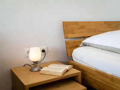 Ein Bett oder Betten in einem Zimmer der Unterkunft Apartment Butterblume - B808 by Interhome