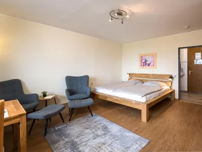Ein Bett oder Betten in einem Zimmer der Unterkunft Apartment Relax - B907 by Interhome