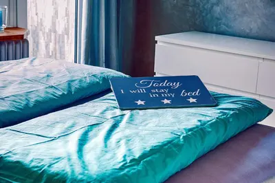 Ein Bett oder Betten in einem Zimmer der Unterkunft Holiday Trier City