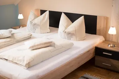 Ein Bett oder Betten in einem Zimmer der Unterkunft Haus Helene