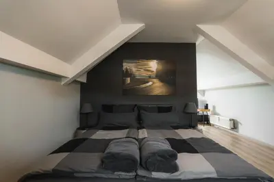 Ein Bett oder Betten in einem Zimmer der Unterkunft NürbLife Hotel