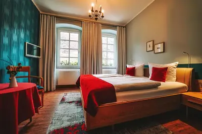 Ein Bett oder Betten in einem Zimmer der Unterkunft Landgasthaus am Ufer
