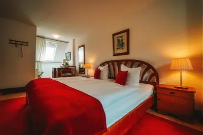 Ein Bett oder Betten in einem Zimmer der Unterkunft Landgasthaus am Ufer