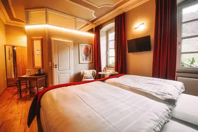 Ein Bett oder Betten in einem Zimmer der Unterkunft Landgasthaus am Ufer