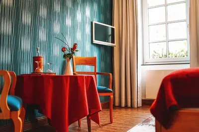 Ein Sitzbereich in der Unterkunft Landgasthaus am Ufer