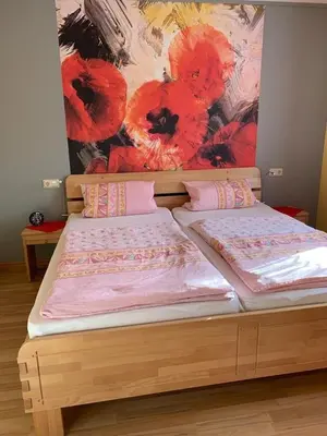 Ein Bett oder Betten in einem Zimmer der Unterkunft Sonnigesüdeifel