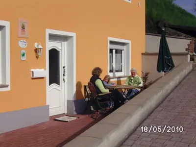 Ein Sitzbereich in der Unterkunft Sonnigesüdeifel