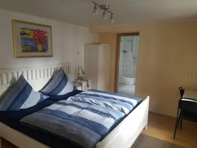 Ein Bett oder Betten in einem Zimmer der Unterkunft Gästehaus Kloep