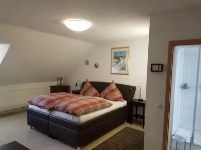 Ein Bett oder Betten in einem Zimmer der Unterkunft Gästehaus Kloep