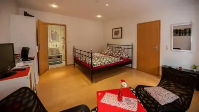 Ein Bett oder Betten in einem Zimmer der Unterkunft Zimmer am Markt